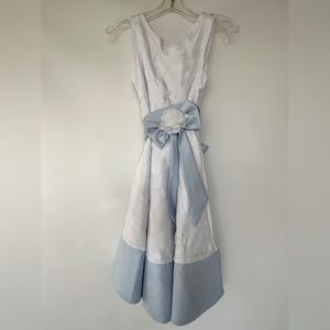 Girls white with large blue bow sash dress
